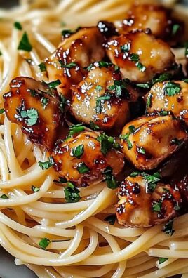 Aromatyczny kurczak w miodowo-czosnkowej glazurze z kremowym spaghetti